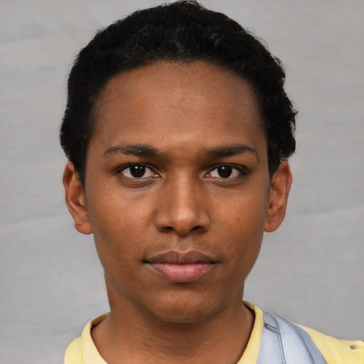 Neutral black young-adult male with short  black hair and brown eyes