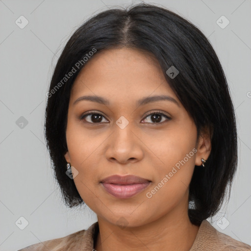 Joyful latino young-adult female with medium  black hair and brown eyes