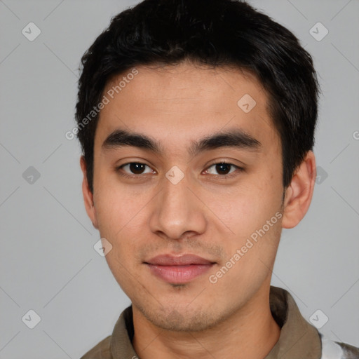 Joyful white young-adult male with short  black hair and brown eyes