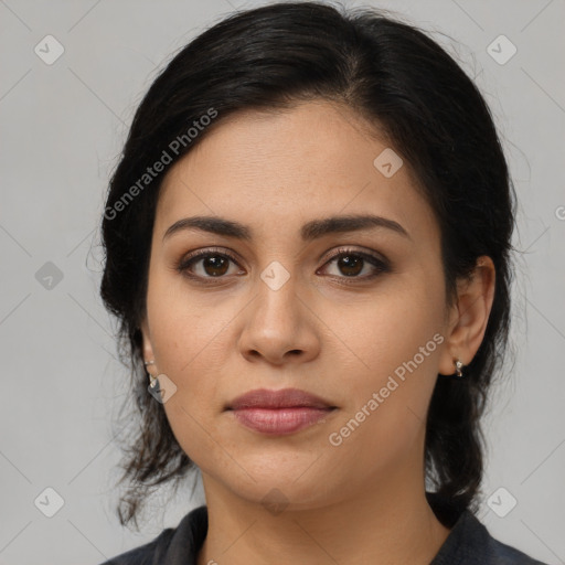 Joyful latino young-adult female with medium  black hair and brown eyes