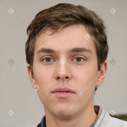 Neutral white young-adult male with short  brown hair and grey eyes