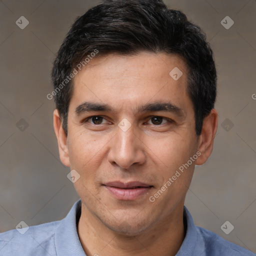 Joyful white adult male with short  black hair and brown eyes