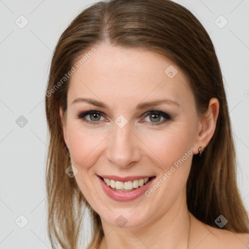 Joyful white young-adult female with long  brown hair and grey eyes