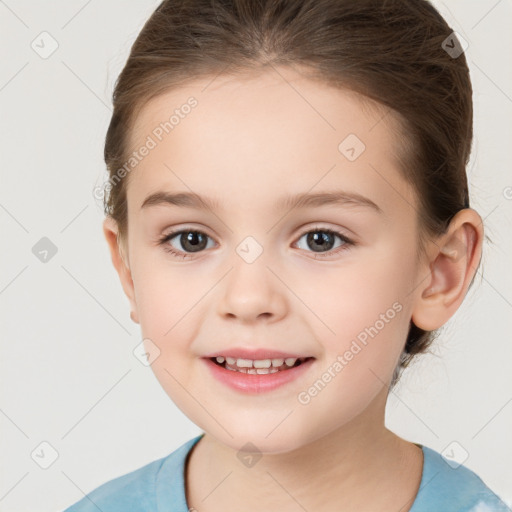 Joyful white child female with medium  brown hair and brown eyes