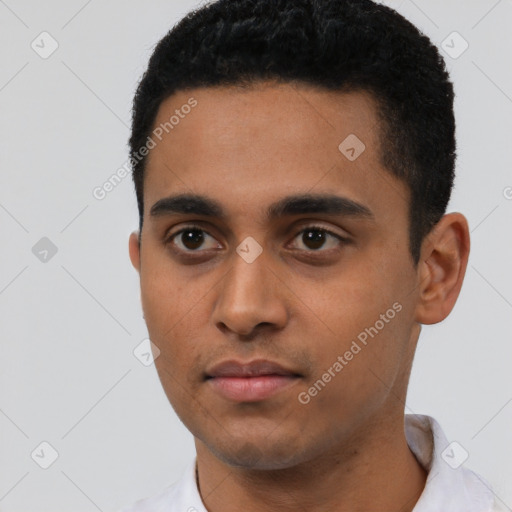 Neutral latino young-adult male with short  black hair and brown eyes