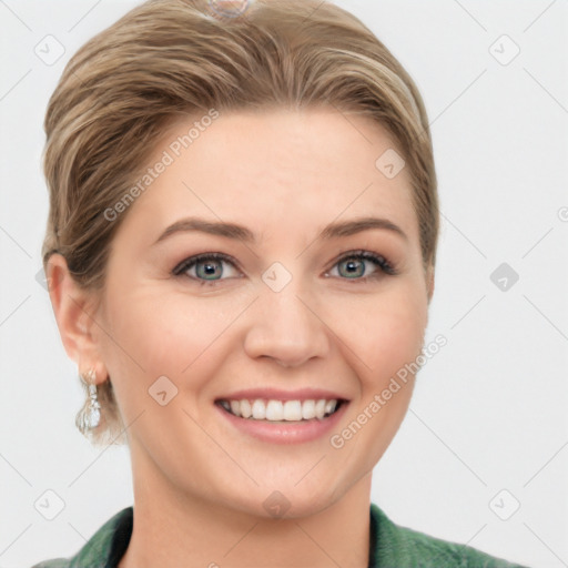 Joyful white young-adult female with medium  brown hair and green eyes