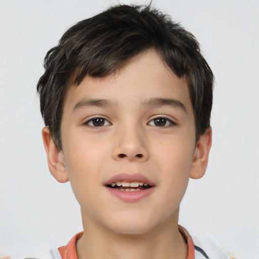 Joyful white child male with short  brown hair and brown eyes