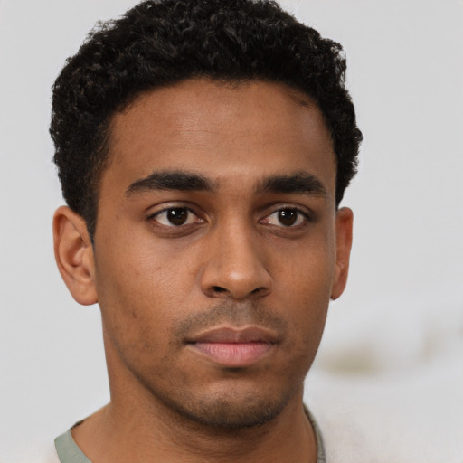 Neutral latino young-adult male with short  brown hair and brown eyes