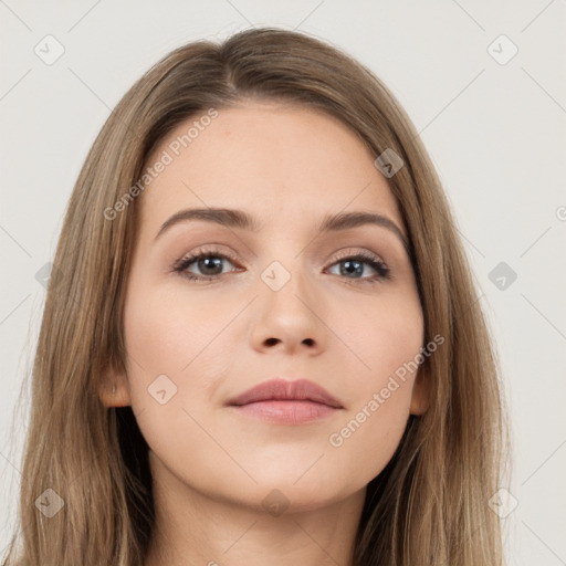 Neutral white young-adult female with long  brown hair and brown eyes