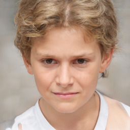 Joyful white child female with short  brown hair and brown eyes