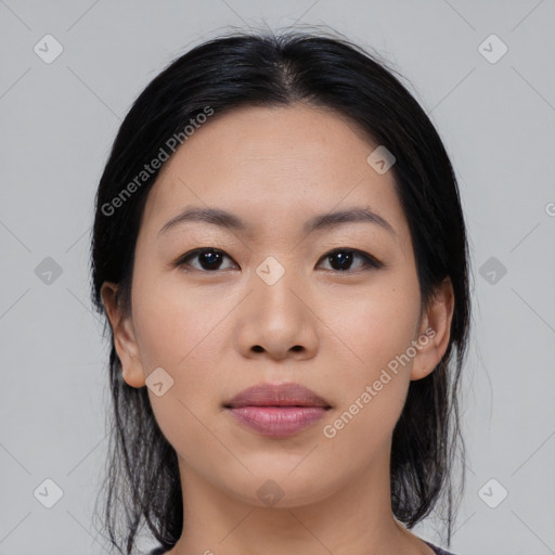 Joyful asian young-adult female with medium  black hair and brown eyes