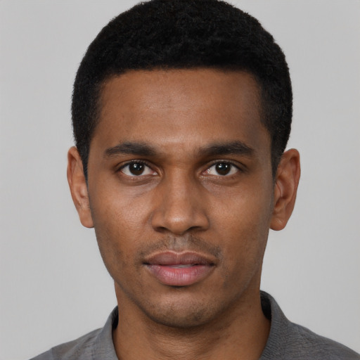 Neutral black young-adult male with short  black hair and brown eyes