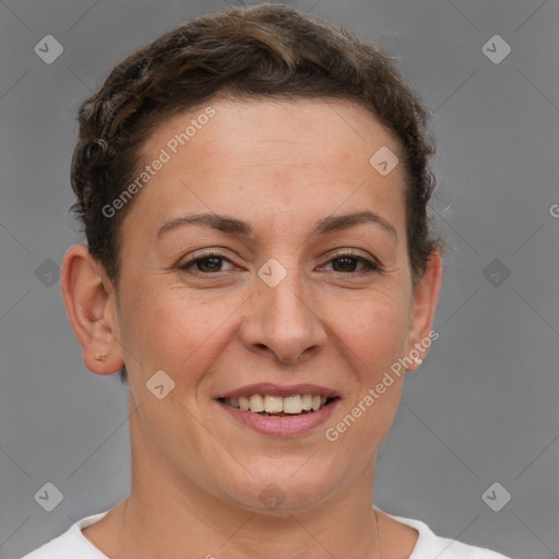 Joyful white adult female with short  brown hair and brown eyes