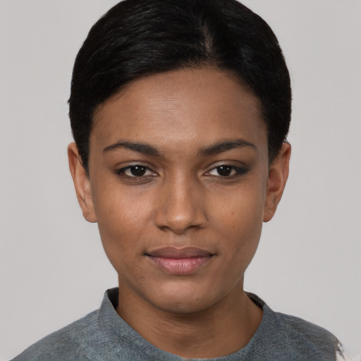 Neutral black young-adult female with short  black hair and brown eyes