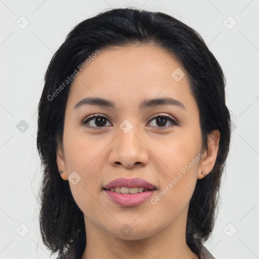 Joyful latino young-adult female with medium  black hair and brown eyes