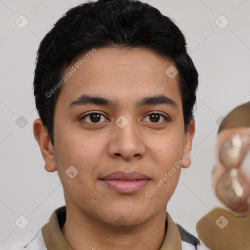 Joyful latino young-adult male with short  black hair and brown eyes