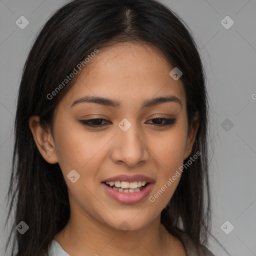 Joyful latino young-adult female with long  brown hair and brown eyes