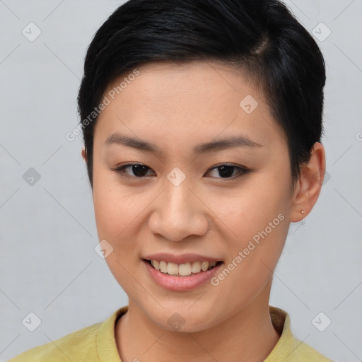 Joyful asian young-adult female with short  brown hair and brown eyes