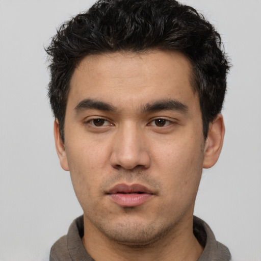 Neutral white young-adult male with short  black hair and brown eyes