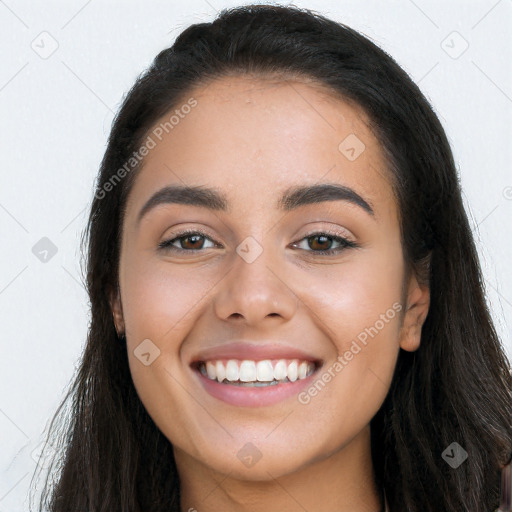 Joyful white young-adult female with long  black hair and brown eyes