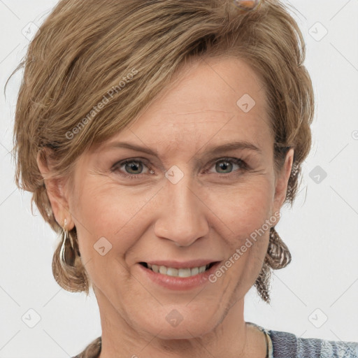 Joyful white adult female with medium  brown hair and grey eyes