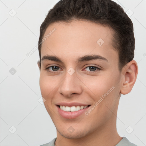 Joyful white young-adult female with short  brown hair and brown eyes