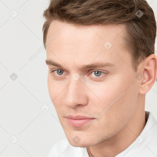 Neutral white young-adult male with short  brown hair and grey eyes