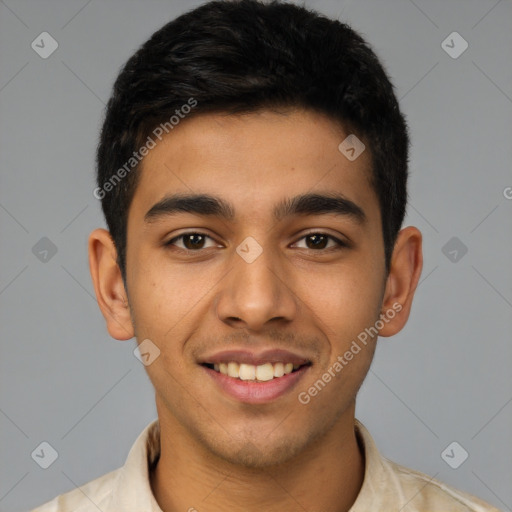 Joyful latino young-adult male with short  brown hair and brown eyes