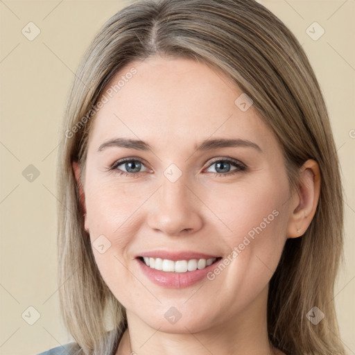 Joyful white young-adult female with long  brown hair and grey eyes