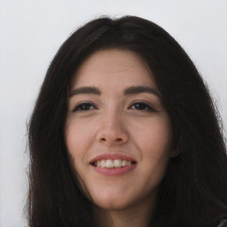 Joyful asian young-adult female with long  brown hair and brown eyes