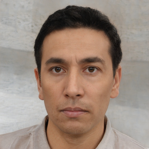 Neutral asian adult male with short  black hair and brown eyes