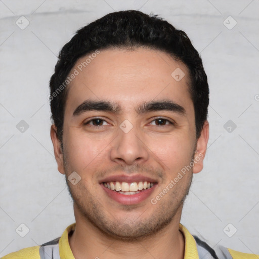 Joyful white young-adult male with short  black hair and brown eyes