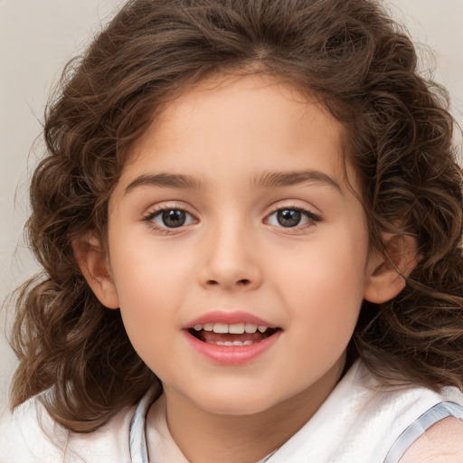 Joyful white child female with medium  brown hair and brown eyes