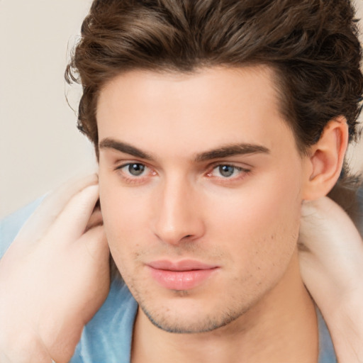 Neutral white young-adult male with medium  brown hair and brown eyes