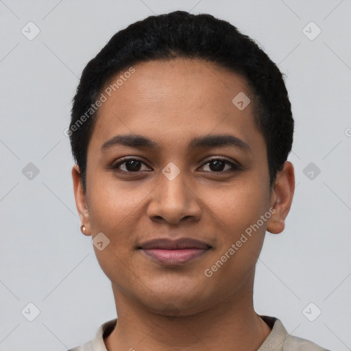 Joyful latino young-adult female with short  black hair and brown eyes