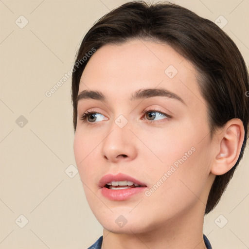 Neutral white young-adult female with short  brown hair and brown eyes