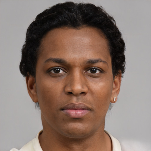Neutral black young-adult female with short  brown hair and brown eyes