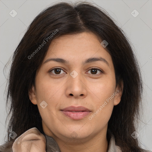 Joyful white adult female with medium  brown hair and brown eyes