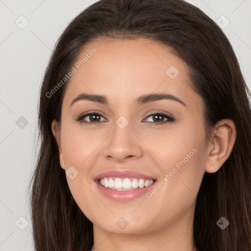 Joyful white young-adult female with long  brown hair and brown eyes