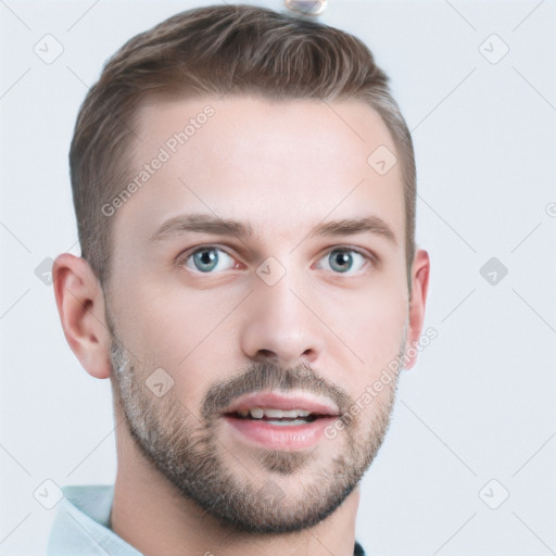 Joyful white young-adult male with short  brown hair and grey eyes