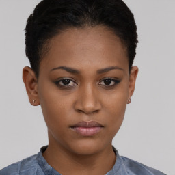 Neutral black young-adult female with short  brown hair and brown eyes