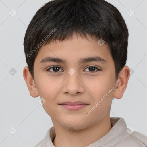 Joyful white child male with short  brown hair and brown eyes