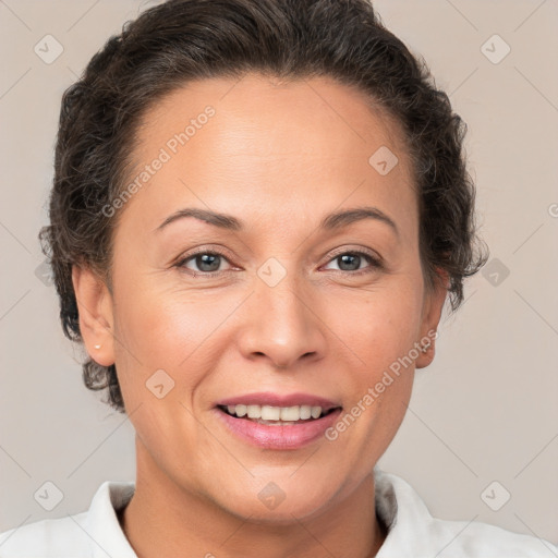 Joyful white adult female with short  brown hair and brown eyes