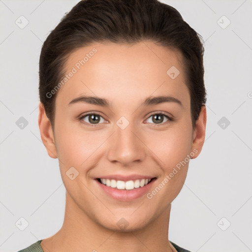 Joyful white young-adult female with short  brown hair and brown eyes