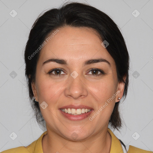 Joyful white adult female with medium  brown hair and brown eyes