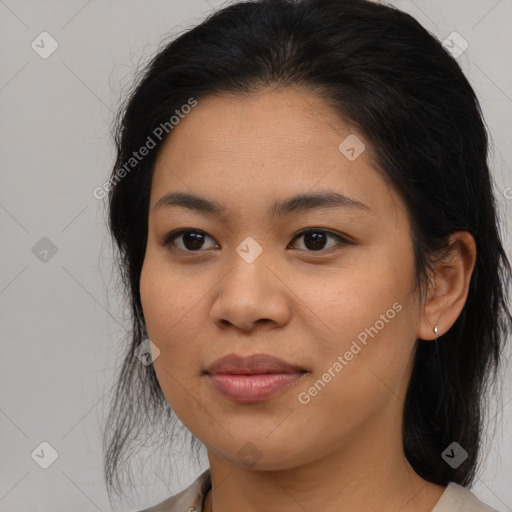 Joyful asian young-adult female with medium  brown hair and brown eyes