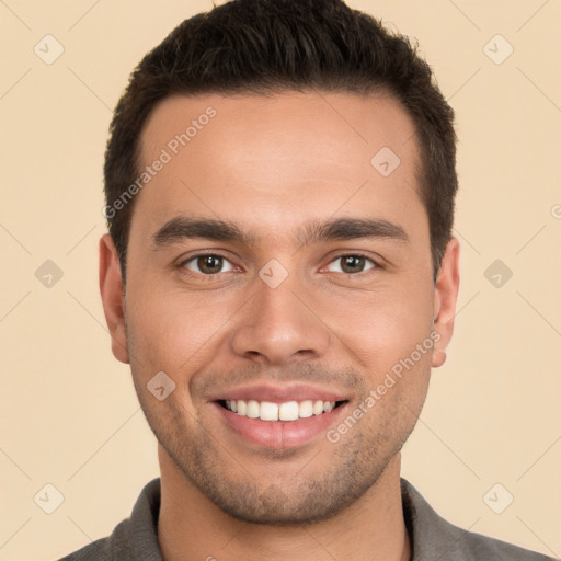 Joyful white young-adult male with short  brown hair and brown eyes