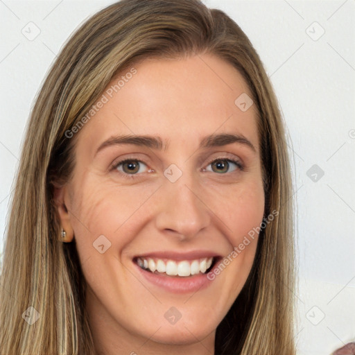 Joyful white young-adult female with long  brown hair and brown eyes