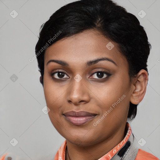 Joyful latino young-adult female with short  black hair and brown eyes