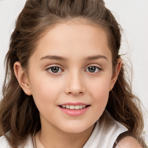 Joyful white child female with long  brown hair and brown eyes